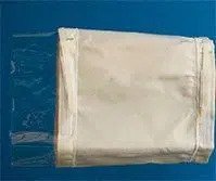 American Fabric Filter Clamp Slits. Las cuñas de sujeción facilitan la colocación de la manga.